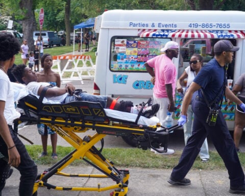 Police zero in on 2 suspects after a mass shooting at a festival in Toledo, Ohio