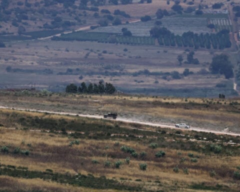 Israeli airstrikes kill 13 in south Lebanon, Lebanese sources say