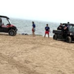 Lifeguards help rescue swimmer who collapsed on beach