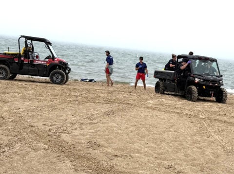Lifeguards help rescue swimmer who collapsed on beach