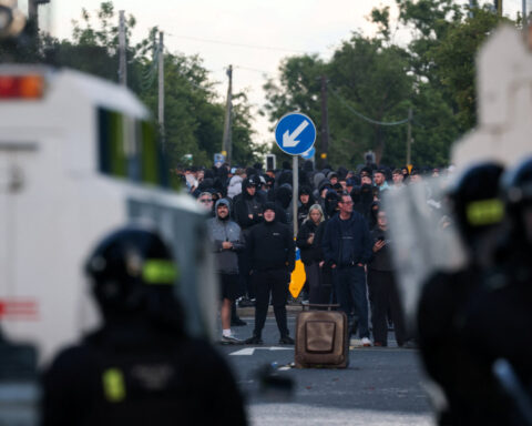 Knife attack victim's family calls for calm after anti-immigrant violence in Belfast
