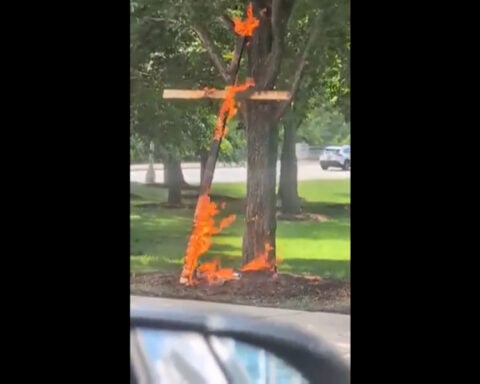 A burning cross in a Chicago park shocks residents and has police searching for who did it