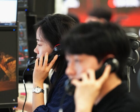 Asian shares mixed after another sell-off of AI stocks on Wall St, while oil prices ease
