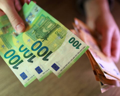 Euro eases after ECB hike; dollar steadies near two-month high on Iran tensions
