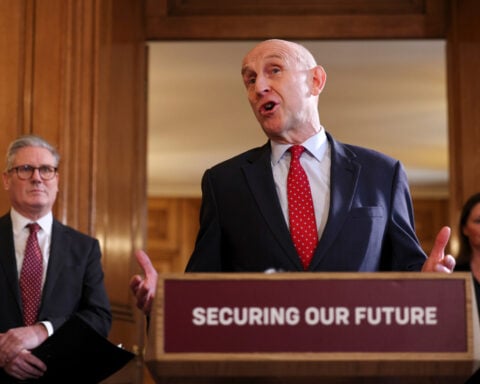 UK defense secretary resigns, saying the government is not willing to spend enough on the military