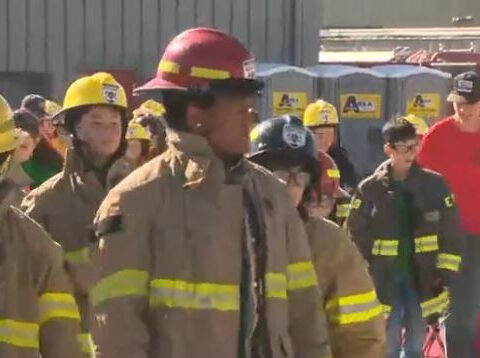 Kid campers learning fire fighting and first responder skills