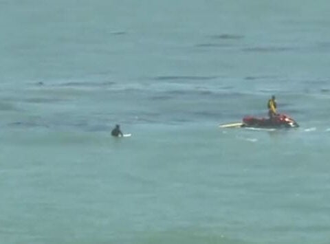 Rising tide catches sleeping beachgoers off guard