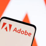 Adobe raises annual revenue forecast, CFO to exit