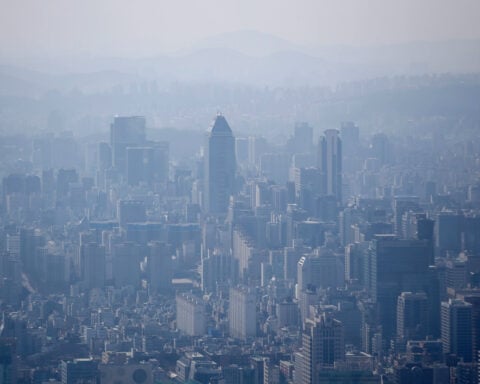 Bank of Korea governor says interest rates to be raised 'on time'