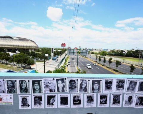 Families of Mexico's disappeared march in the capital as World Cup kicks off