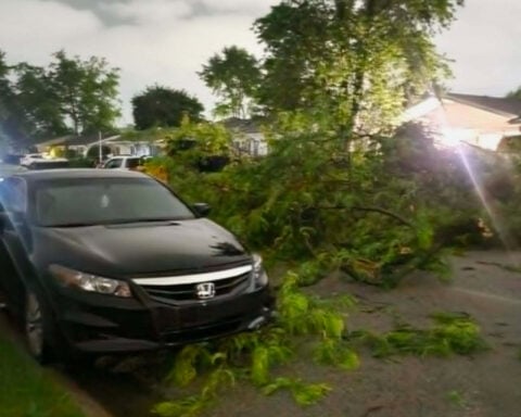 Tornadoes pummel communities outside Chicago, tearing up homes and toppling power poles
