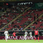 Soccer-Empty seats at World Cup match renews concerns over ticket prices