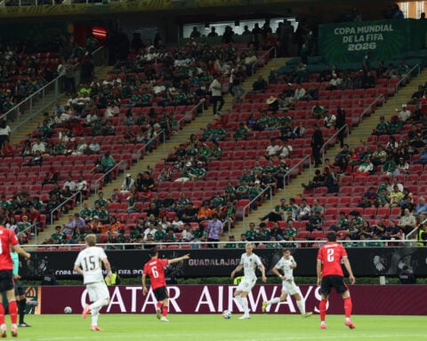 Soccer-Empty seats at World Cup match renews concerns over ticket prices