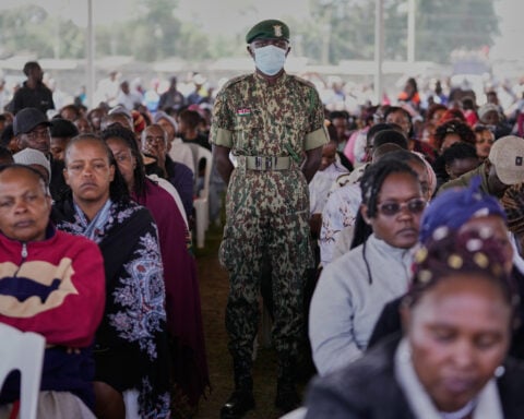 Kenya holds a memorial service for 16 victims of last month's girls school fire