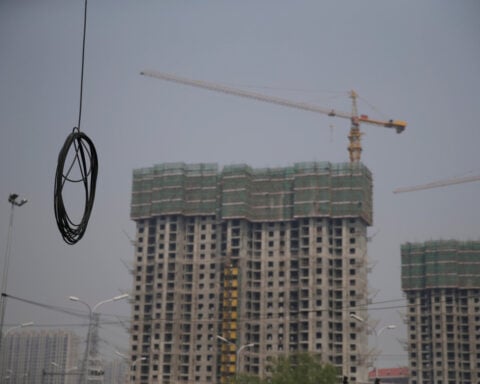 China's new loans miss forecasts in May as property slump curbs demand