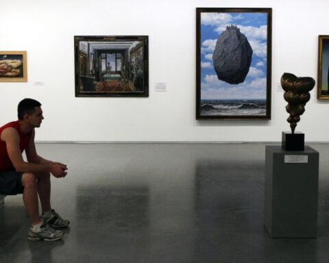 Famed Magritte painting damaged by child with pine cone