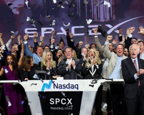 Instant View: SpaceX opens trading at $150 after record-busting IPO