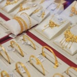 Gold's record rally falters as bulls run into Fed rate expectations, stronger dollar