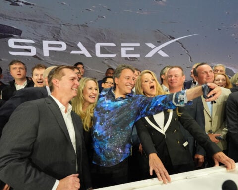 US stocks rise as oil falls and SpaceX soars in its debut on Wall Street