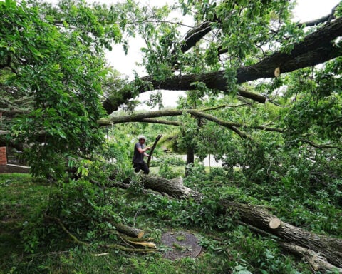 Storm threat shifts into the East after tornadoes, winds kill 3 and level homes in the central US