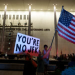 Trump's name is still on the Kennedy Center, though officials say it will be down by noon