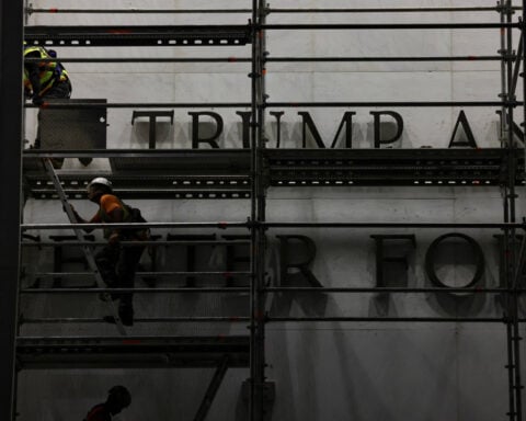 Trump's name removed from Kennedy Center in predawn operation