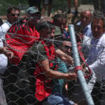 Protesters tear down Albanian development site fences, amid anger over coastal projects