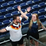 Rain sends Germany and Curacao fans on pre-match hunt for umbrellas and beer