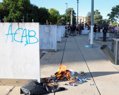 Swiss police fire tear gas as anti-G7 protesters target UN site