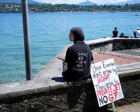 Protesters in Geneva clash with police ahead of the G7 summit in nearby France