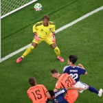 Daichi Kamada's late header gives Japan a 2-2 draw with the Netherlands in World Cup opener for both