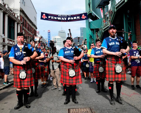 Soccer-Scotland's Tartan Army switches sports for a day in Boston