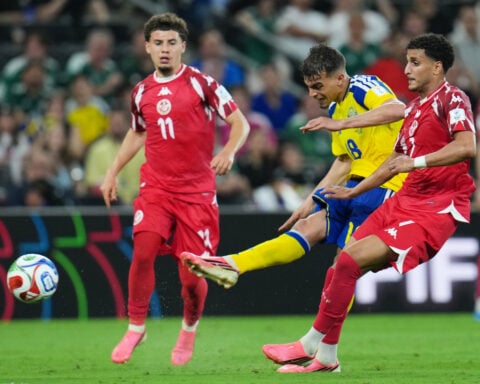 Sweden gets 2 goals from Yasin Ayari and pounds Tunisia 5-1 to move atop World Cup Group F