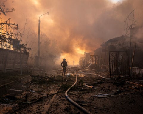 Russian drone and missile barrage on Ukraine's biggest cities kill at least 10 people