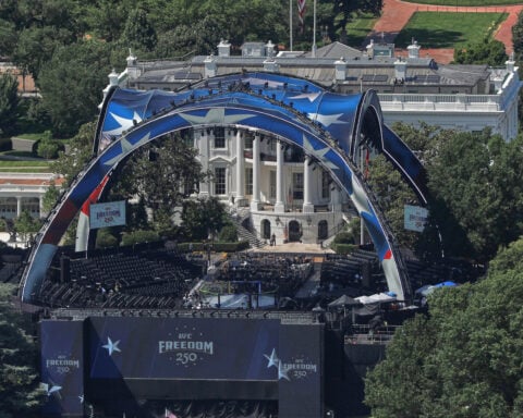 The Latest: Trump celebrates his 80th birthday with Iran deal and UFC cage fight at the White House