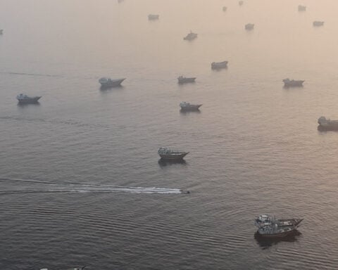 Trump says ships carrying oil are moving out of Strait of Hormuz