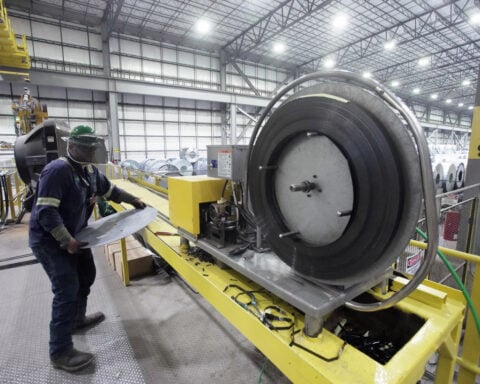 US factory production flat in May; AI investment supporting manufacturing