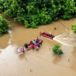 Firefighters help rescue 15 campers from rising floodwaters