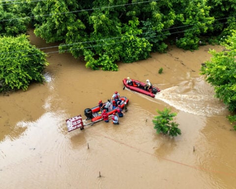Firefighters help rescue 15 campers from rising floodwaters