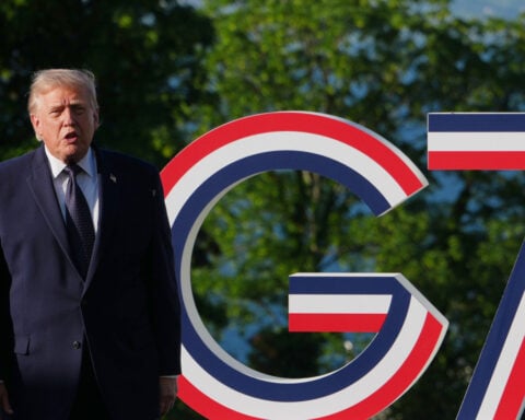 The Latest: Trump projects confidence about Iran deal as he meets global leaders for G7 summit