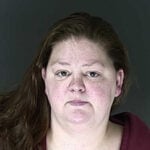 Woman accused of feeding neighbor’s cat to dogs