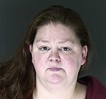 Woman accused of feeding neighbor’s cat to dogs