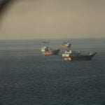 U.S. officials say Iran pact signed, Hormuz traffic will rise significantly