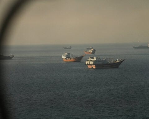 U.S. officials say Iran pact signed, Hormuz traffic will rise significantly
