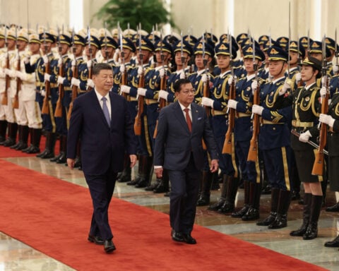 China's Xi backs Myanmar's president as two leaders meet in Beijing