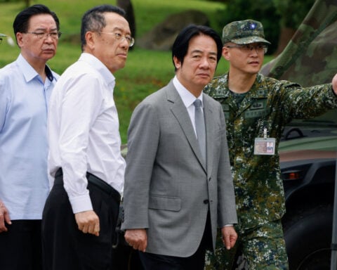Taiwan president says he 'won't give up' on defence spending after parliament cuts