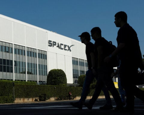 SpaceX vaults past Amazon's market value as options listing fuels surge