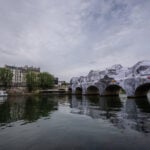 Monumental cave art on Paris' oldest bridge finally opens, as the public steps and sniffs inside