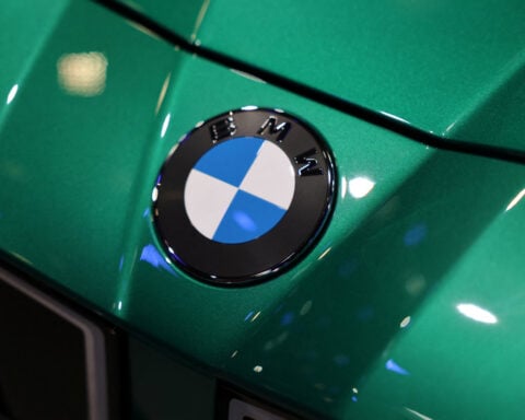 BMW lowers 2026 outlook on China downturn, Iran war