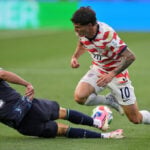 US forward Christian Pulisic practices on his own in calf injury rehab, team says he is 'day to day'